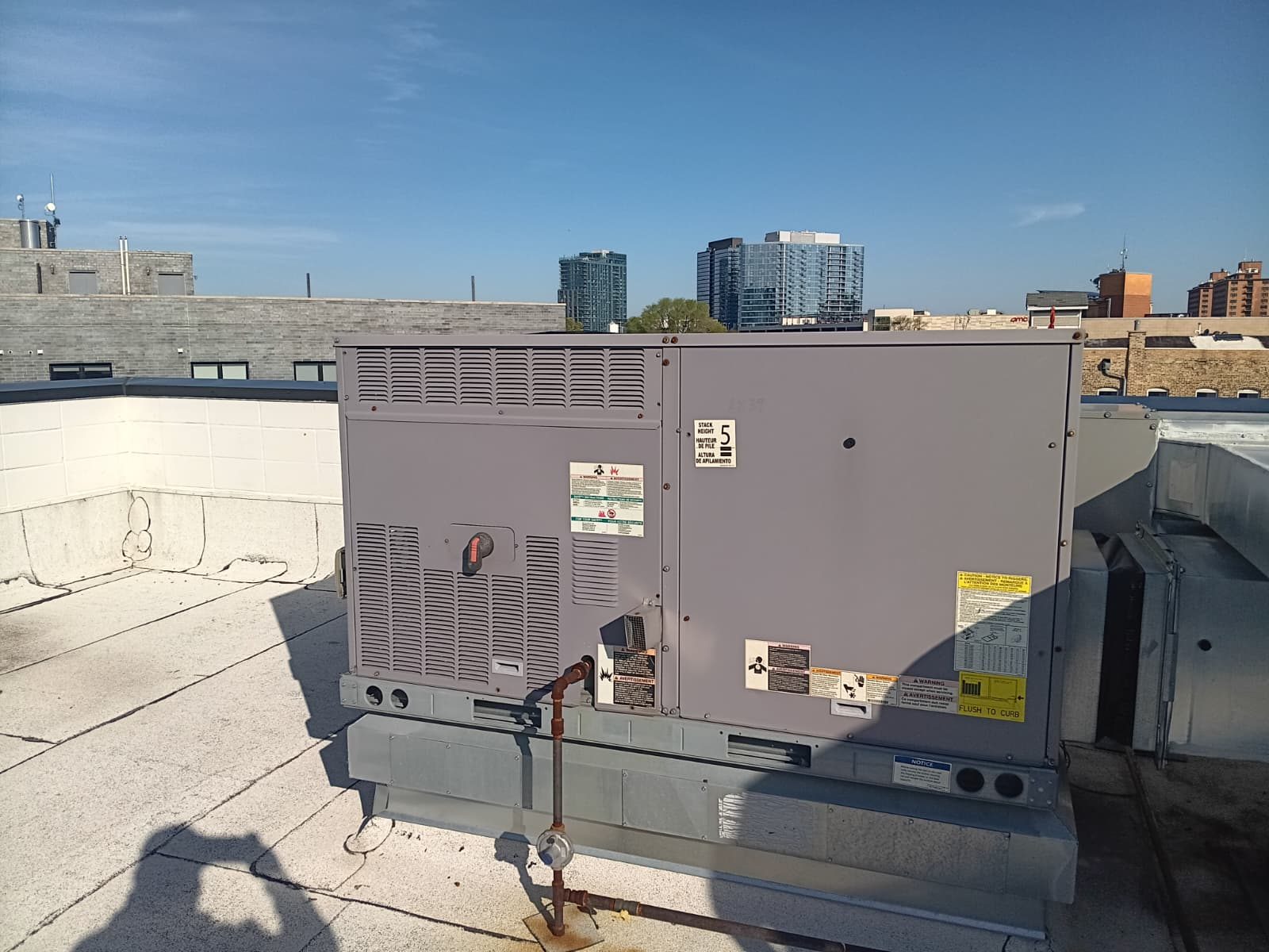 Commercial rooftop HVAC unit installed on a Chicago building